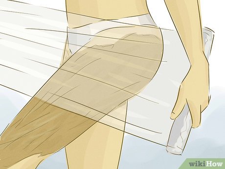 Step 2 Use a body wrap to temporarily look slimmer.